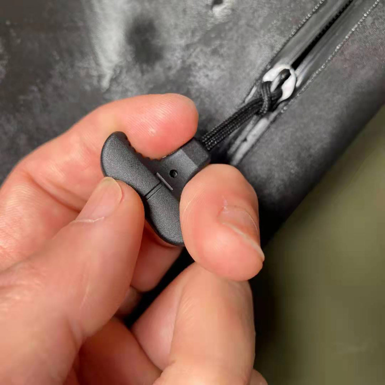 Rescue Essentials T Grip Zipper Pulls, in use