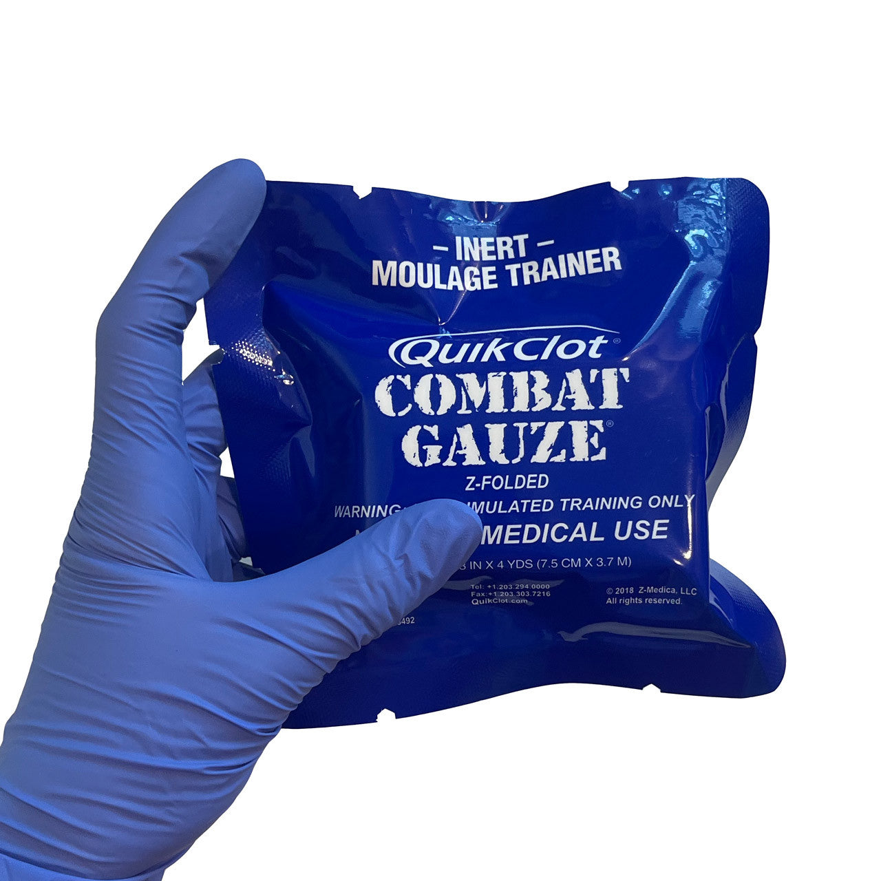QuikClot Combat Gauze Trainer Package, packaged in hand