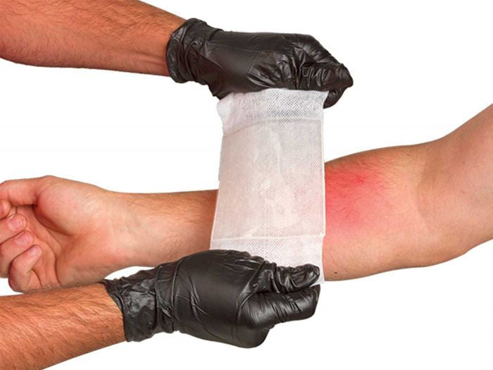 BurnTec® Dressing, being put on arm