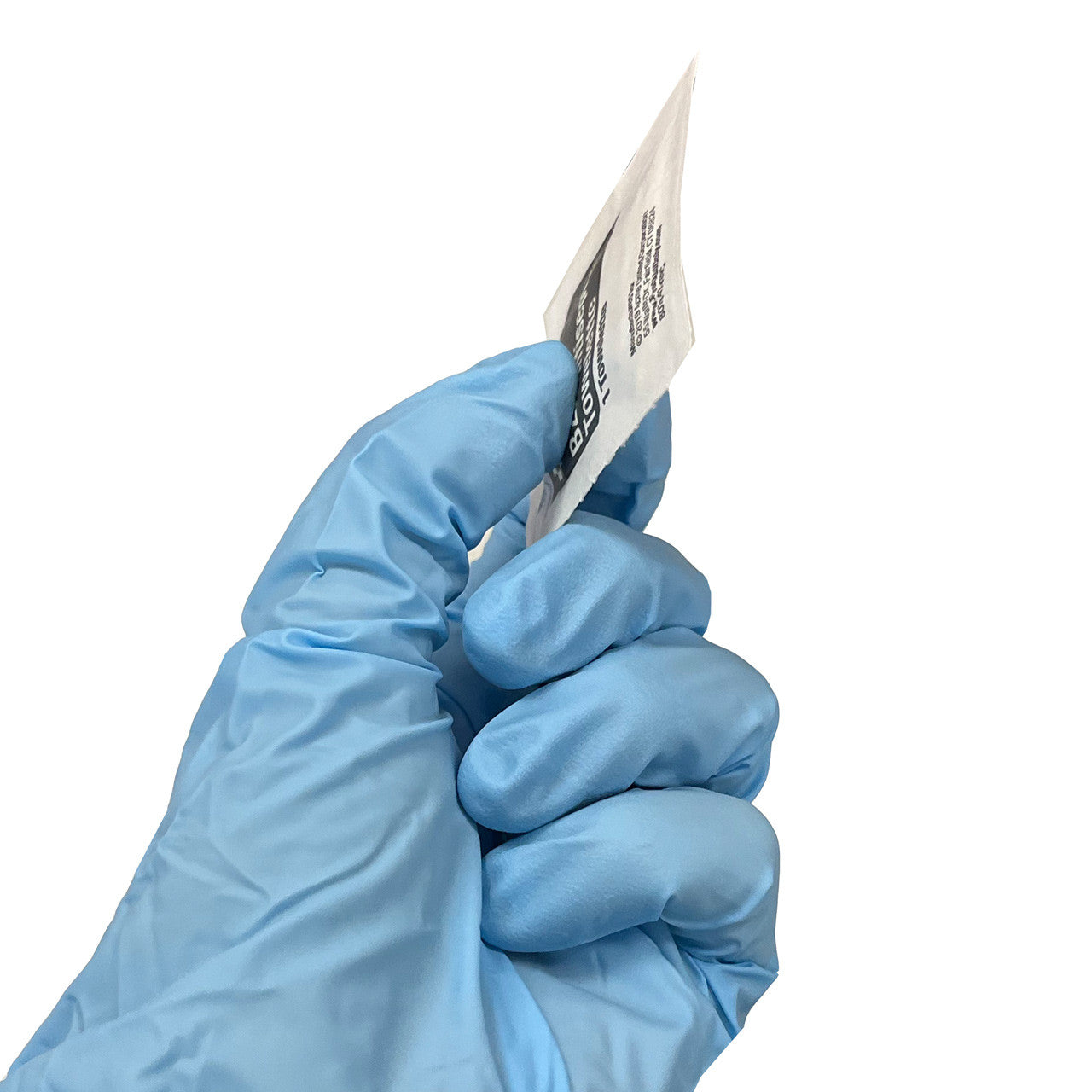 single BZK Antiseptic Towelette, in hand -side view