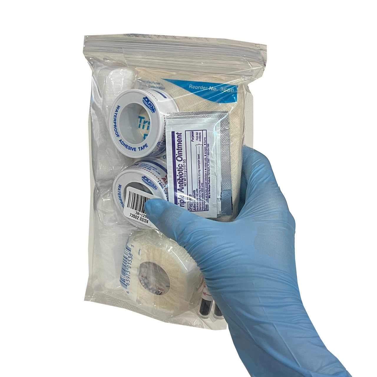 Universal First Aid Refill Kit, in hand - back