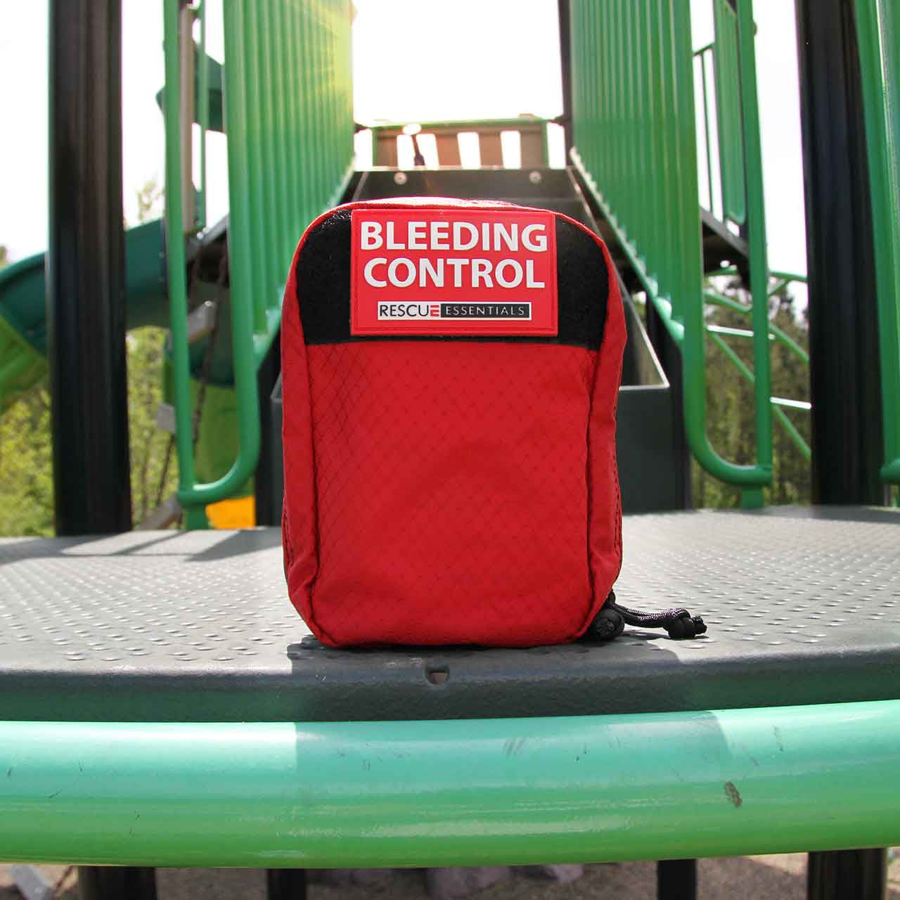 Bleeding Control Station IFAK - Advanced pouch containing Stop the Bleed products, on playground equipment