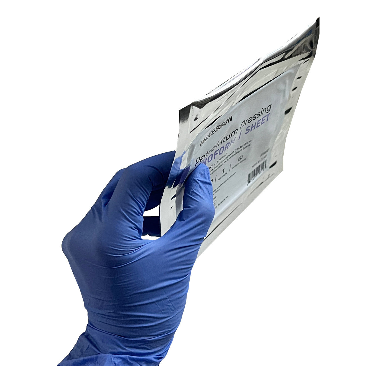4" x 4" Petrolatum Impregnated Gauze Dressing, in hand showing thinness