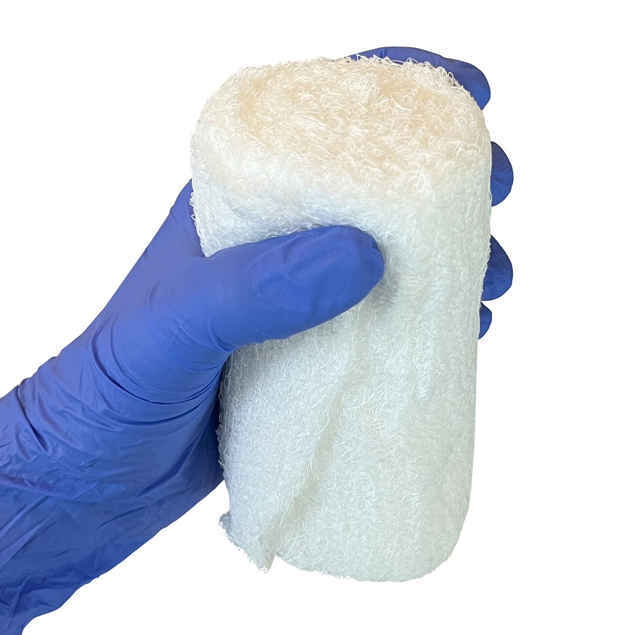 Fluff Bandage Roll, in hand