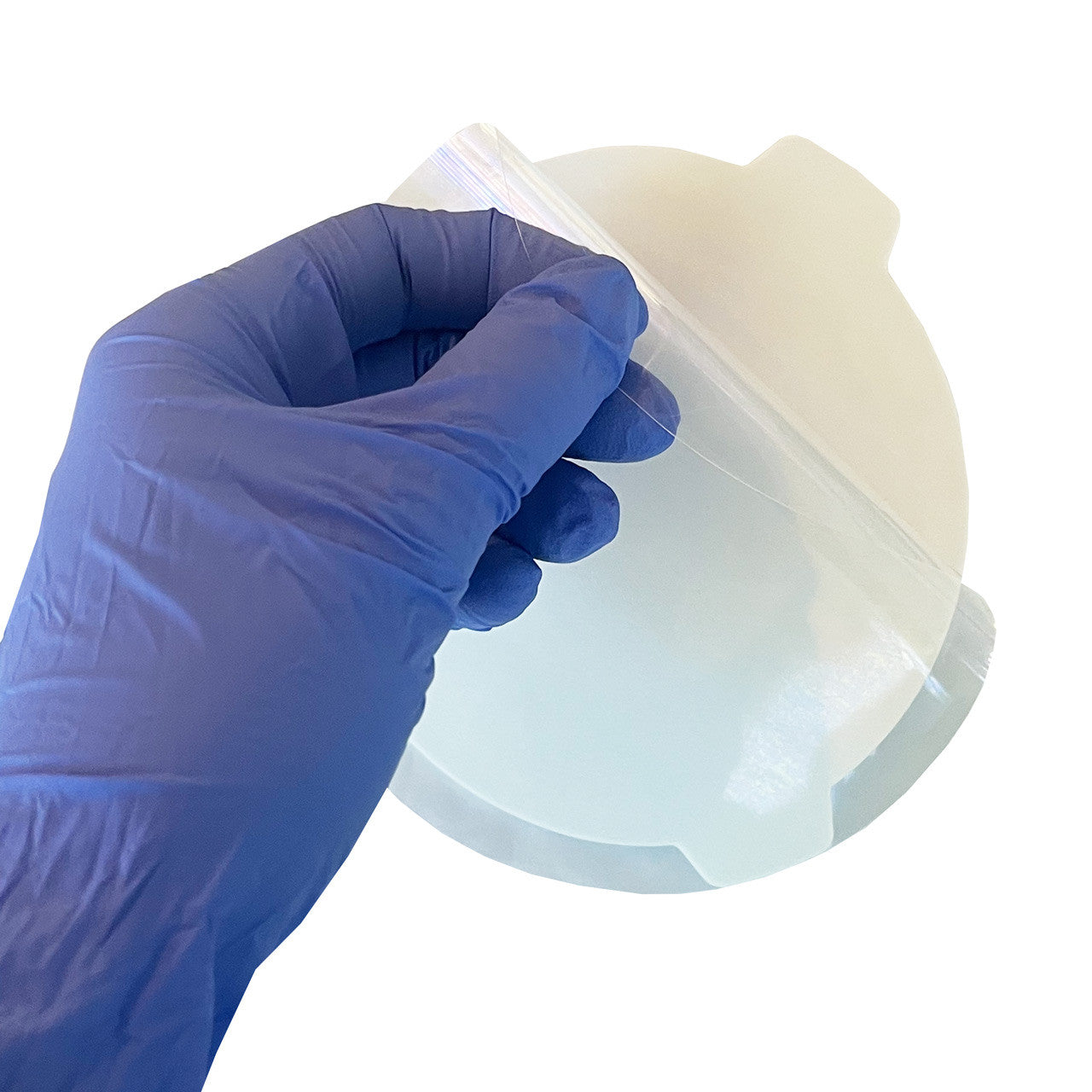 Simu-Seal Chest Seal Trainer, peeled in hand