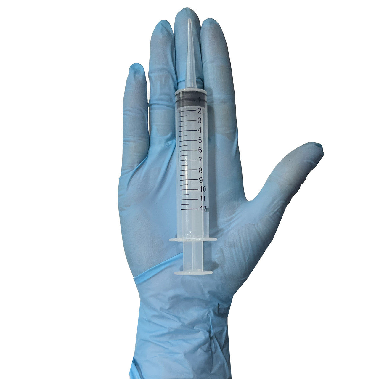 12cc Irrigation Syringe, in hand showing size
