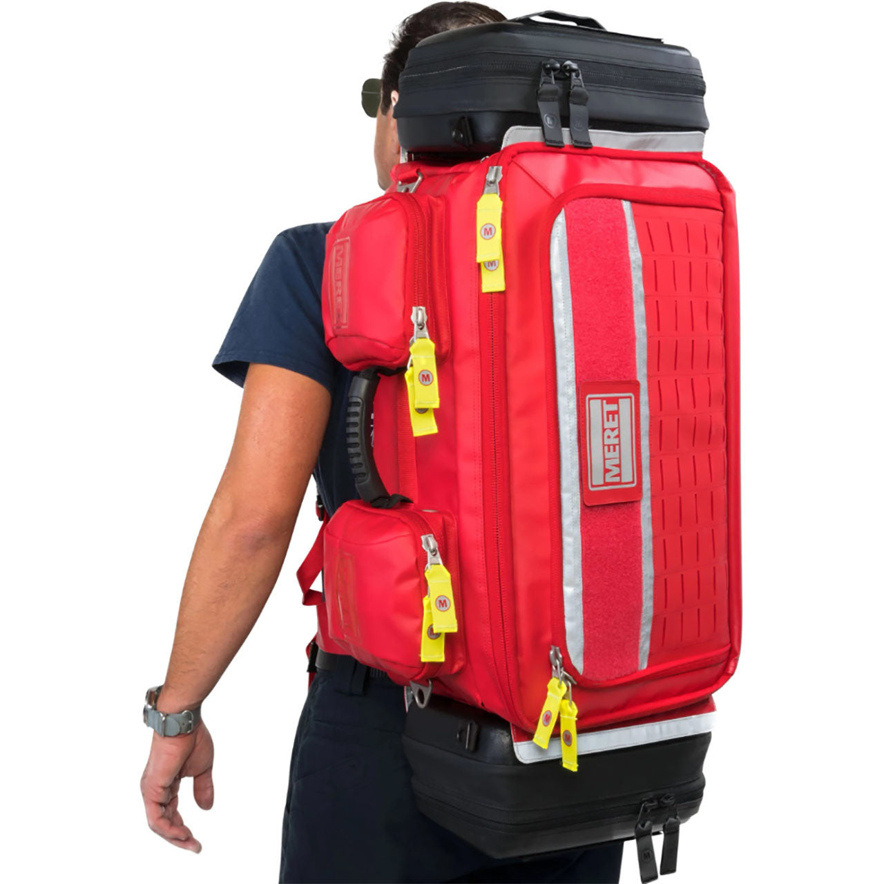 OMNI PRO X Bag by Meret in red on person in back pack mode