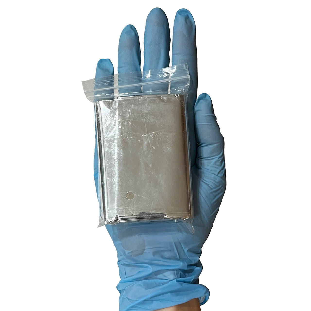 Compact Rescue Blanket, packaged in hand showing size