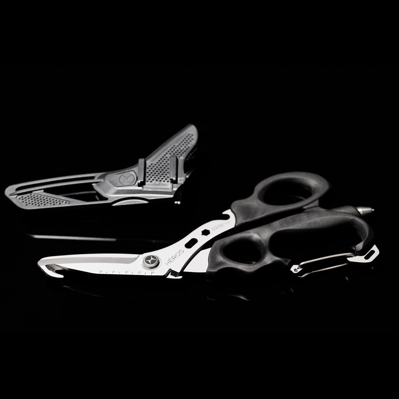 Heros shears, black, on black background with sheath
