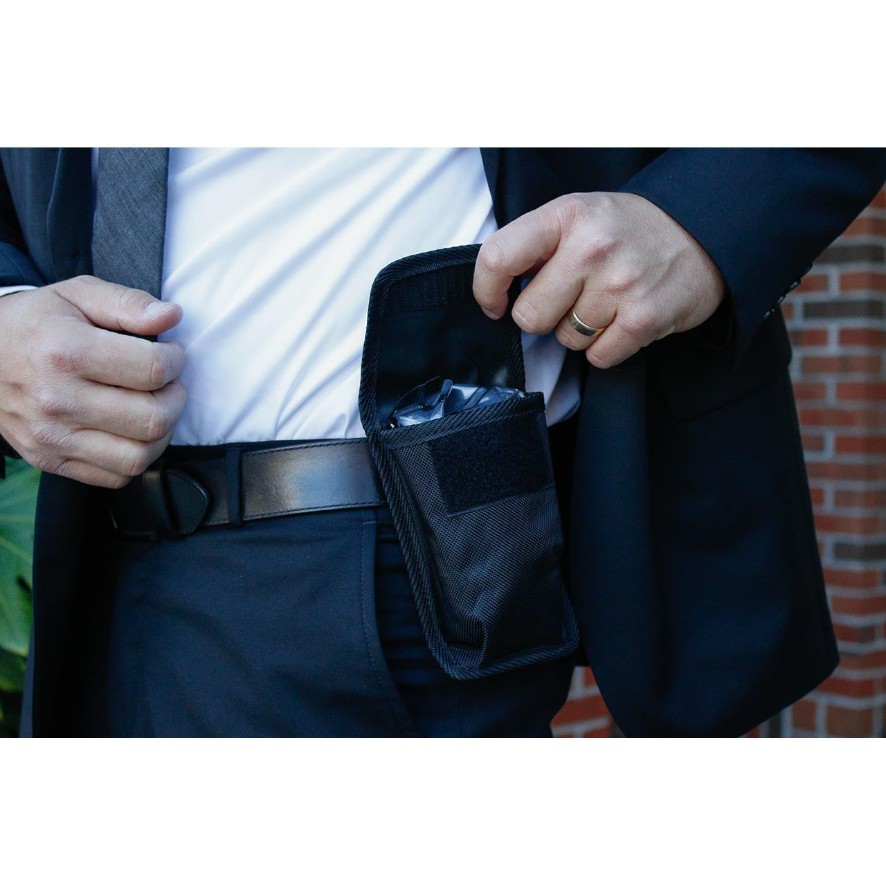 Patrol Officer's Pocket Trauma Kit shown on belt