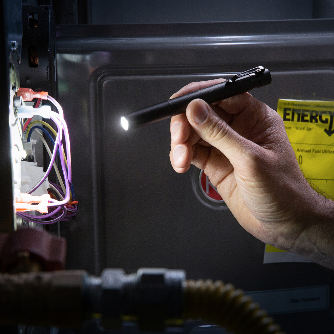 Radiant® Rechargeable Pen Light, in hand
