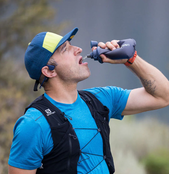 Lifestraw Peak Series Collapsible Squeeze 650mL Bottle with Filter being used by male