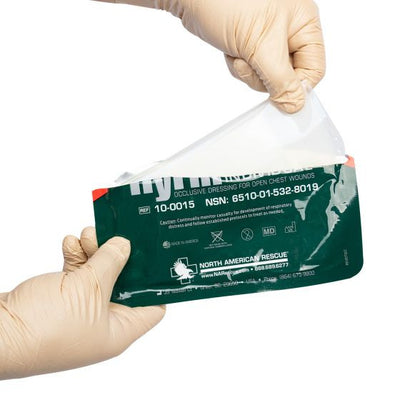 NAR HyFin® Chest Seal, being pulled out of packaging