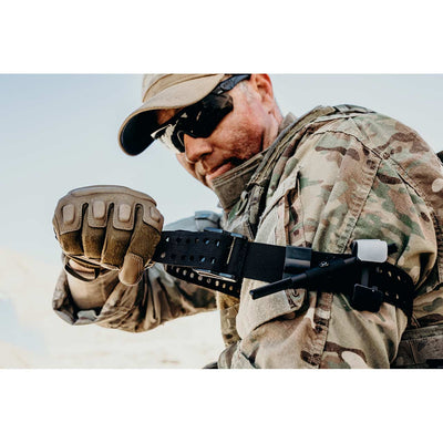 SAM XT Tourniquet by Sam Medical applied to arm in military situation