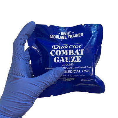 QuikClot Combat Gauze Trainer Package, packaged in hand