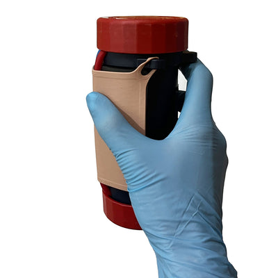 Multi-Insertion Training System (M.I.T.S.) Composite Trainer Kit, Held in hand