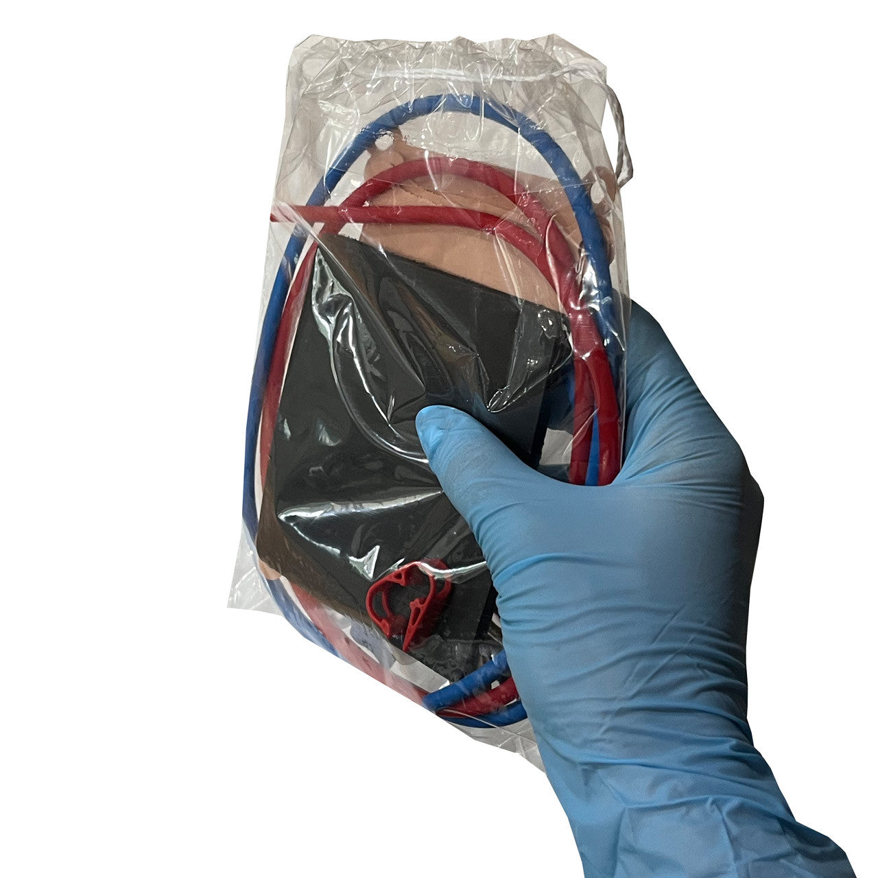 Supply Kit for Mochtech IV Trainer in packaging being held in hand