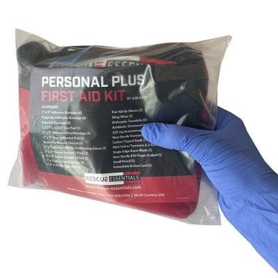 Personal Plus First Aid Kit, packaged in hand