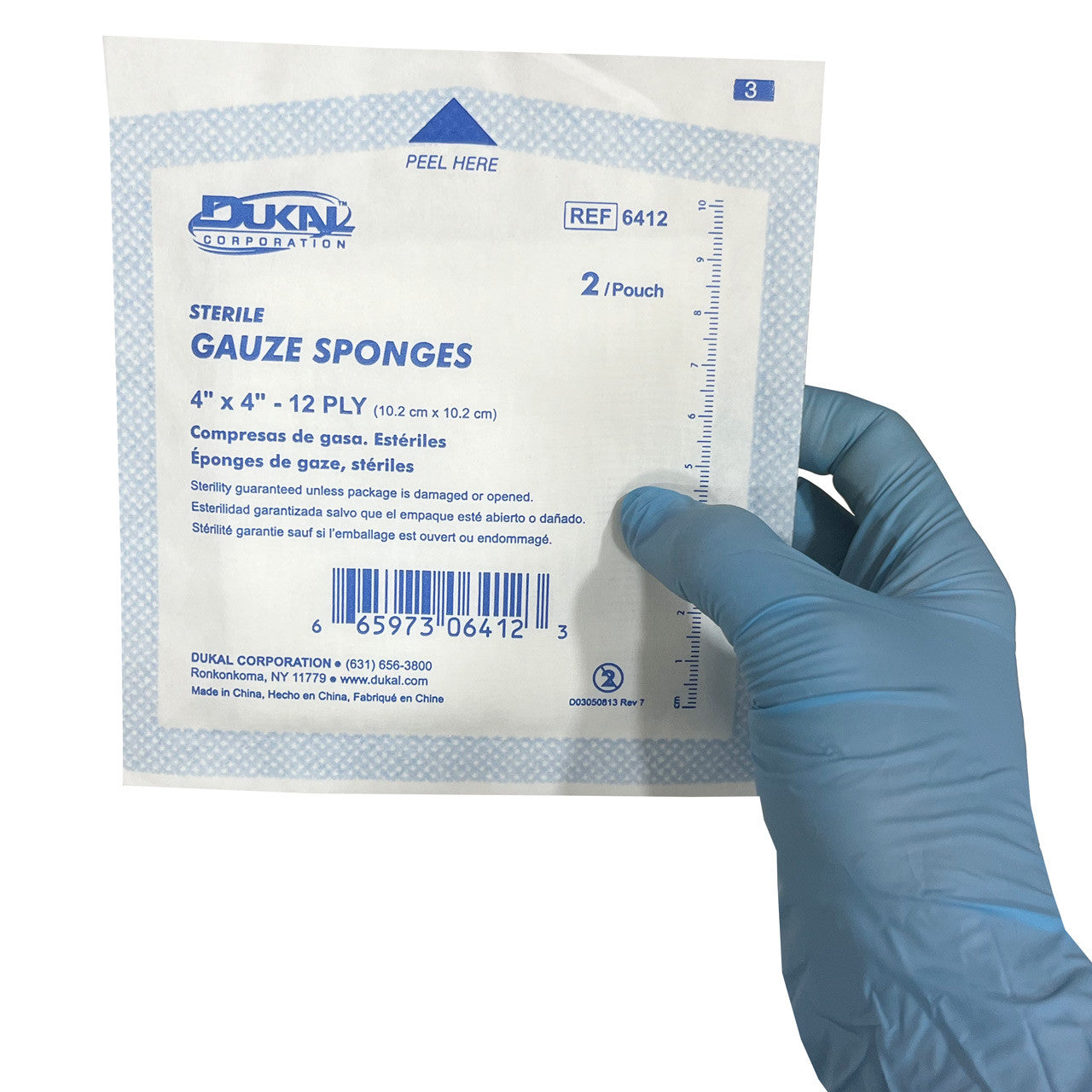 Sterile Gauze 4" x 4" Sponges, one in hand