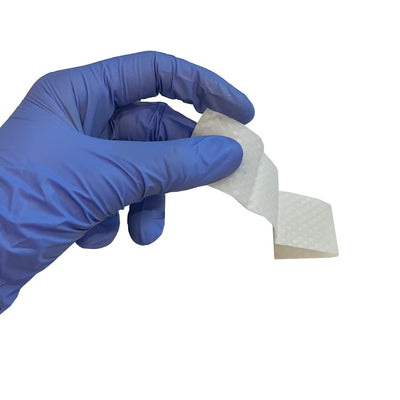 Skin-Tac Adhesive Barrier Wipe in hand