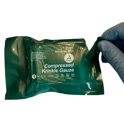 Z Folded Krinkle Gauze, being opened