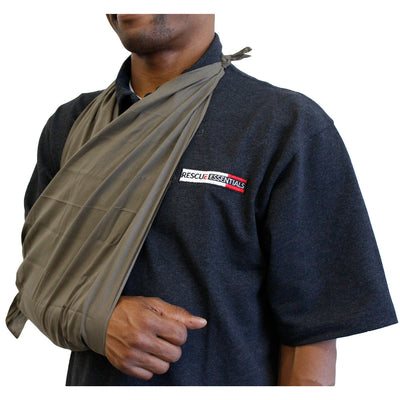 Rescue Essentials Triangle Bandage in use as sling
