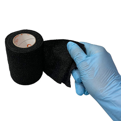 Black Cohesive Wrap, being pulled