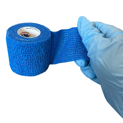 Blue Cohesive Wrap, being unwrapped