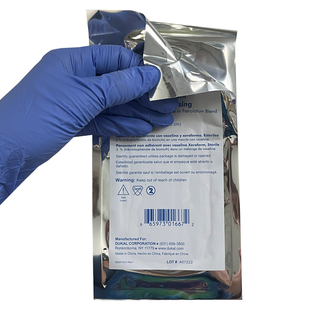 5" x 9" Petrolatum Impregnated Gauze Dressing, being opened