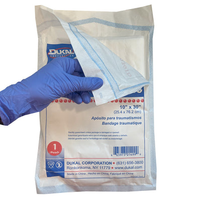 Trauma Dressing, being opened