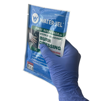 Burn Dressing, in hand showing size
