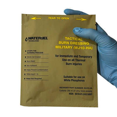 Water-Jel® Military Burn Dressing, packaged in hand