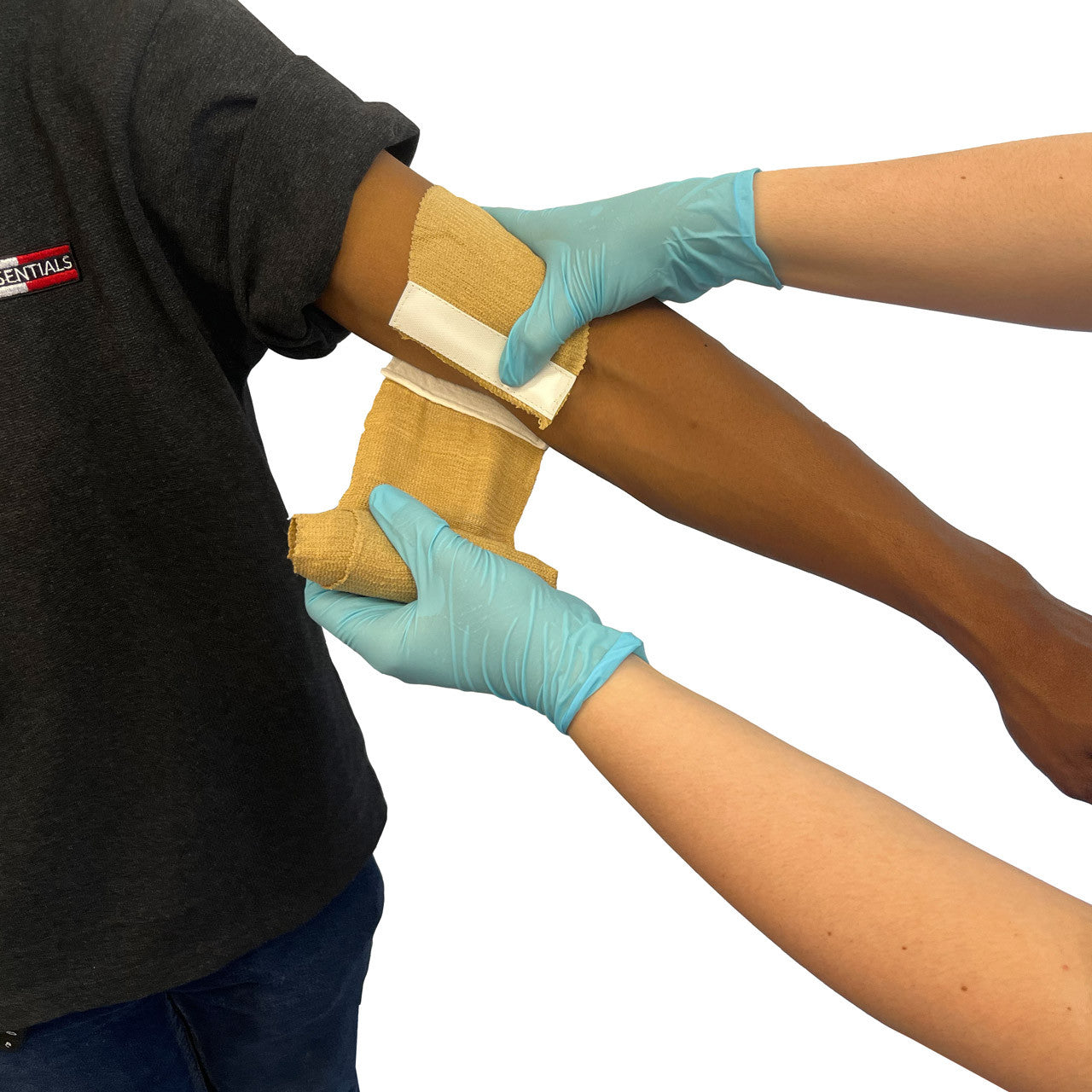 Rescue Essentials Mini Compression Bandage being wrapped around arm