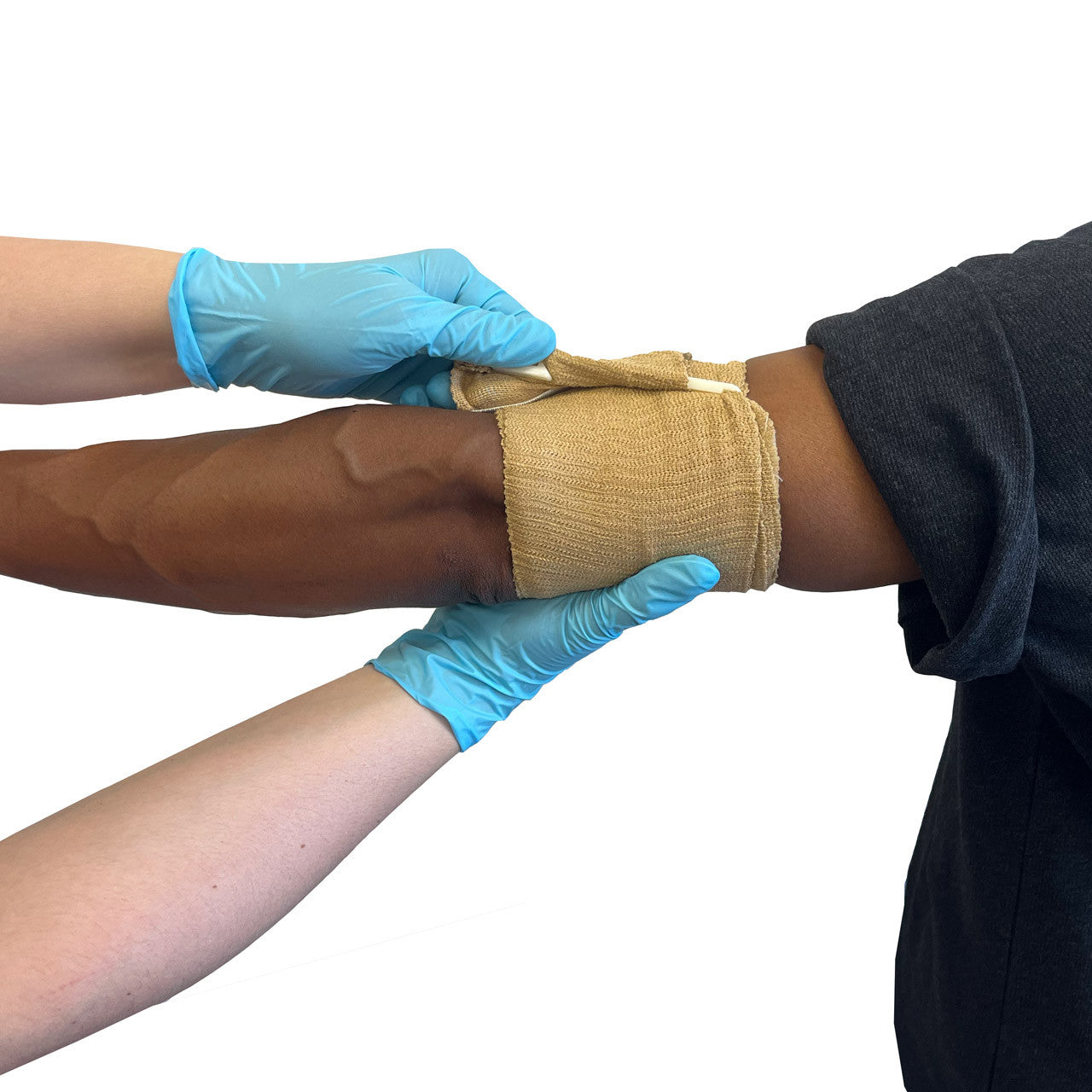Rescue Essentials Mini Compression Bandage in use on arm