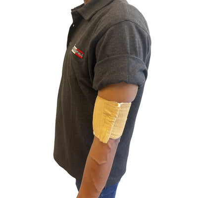Rescue Essentials Mini Compression Bandage in use on arm