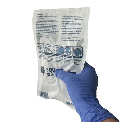 Disposable Instant Hot Pack, held in hand (back)