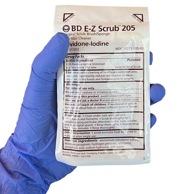 Povidone Iodine Surgical Scrub Brush/Sponge, packaged in hand (front)