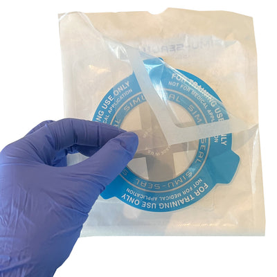 Simu-Seal Chest Seal Trainer, being opened