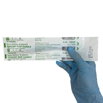Scalpel, in hand (front)