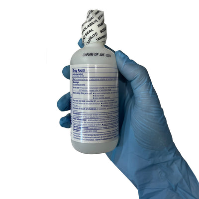 Eyewash, in hand facing back