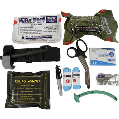 5.11 UCR IFAK by rescue essentials contents laid out on table