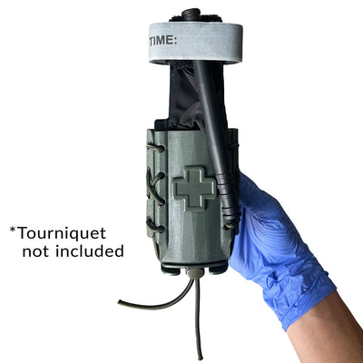 Slick Kydex Tourniquet TACO®, Green - In hand showing tourniquet inside