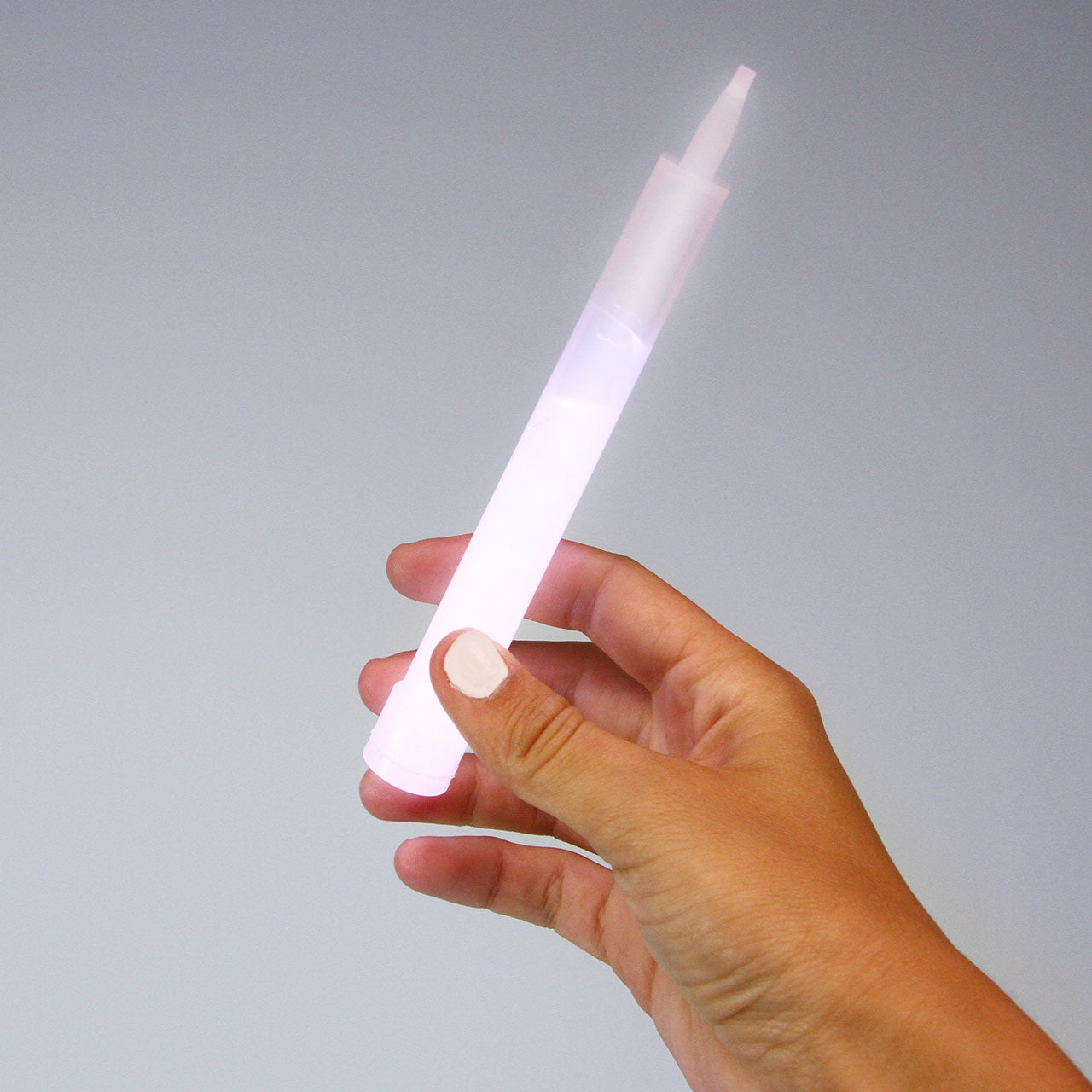 High Intensity Tactical Light, glowing in hand
