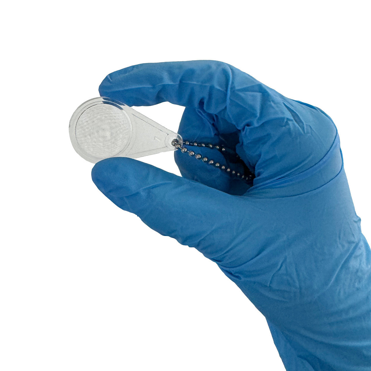 Pro-Tick Remedy, magnifying glass