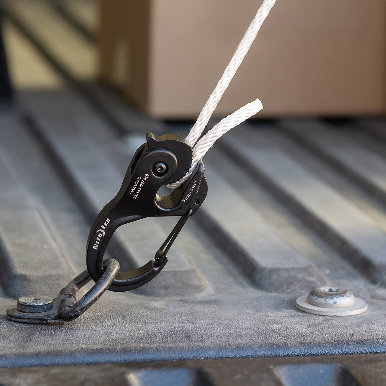 CamJam® XT™ Aluminum Rope Tightener, Reg with rope - in use on truck
