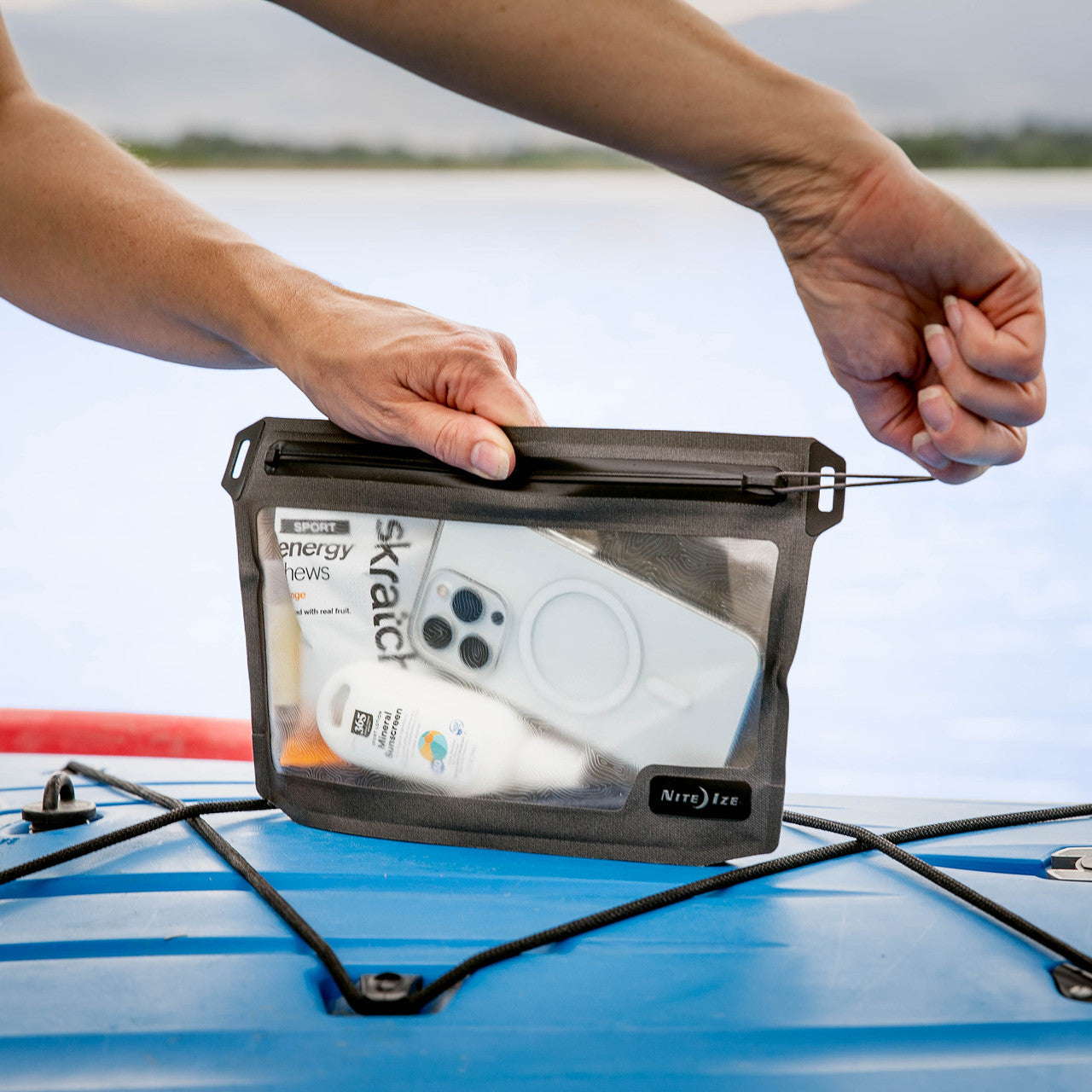 RunOff® Waterproof 3-1-1 Pouch, being zipped