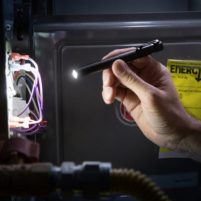 Radiant® Rechargeable Pen Light, in hand