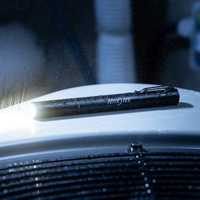 Radiant® Rechargeable Pen Light, turned on in car