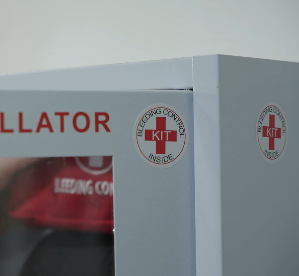 Bleeding Control Designation Stickers on AED cabinet