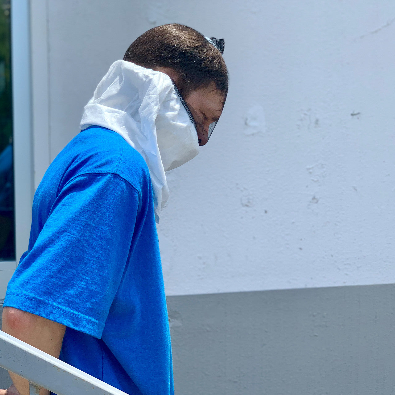 Rescue Essentials TranZport Hood, on head (side profile)